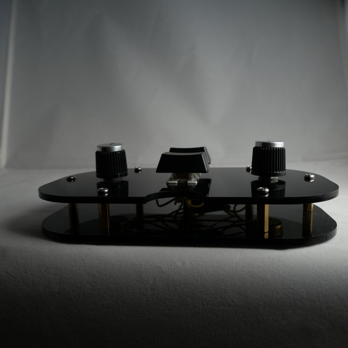 Black Black Acrylic Midi Controller with 2 Note Buttons and 2 Potentiometer KnobsAcrylic Compact Midi Controller with 1 Latching Note Button 1 Potentiometer Knob and LED (Copy)