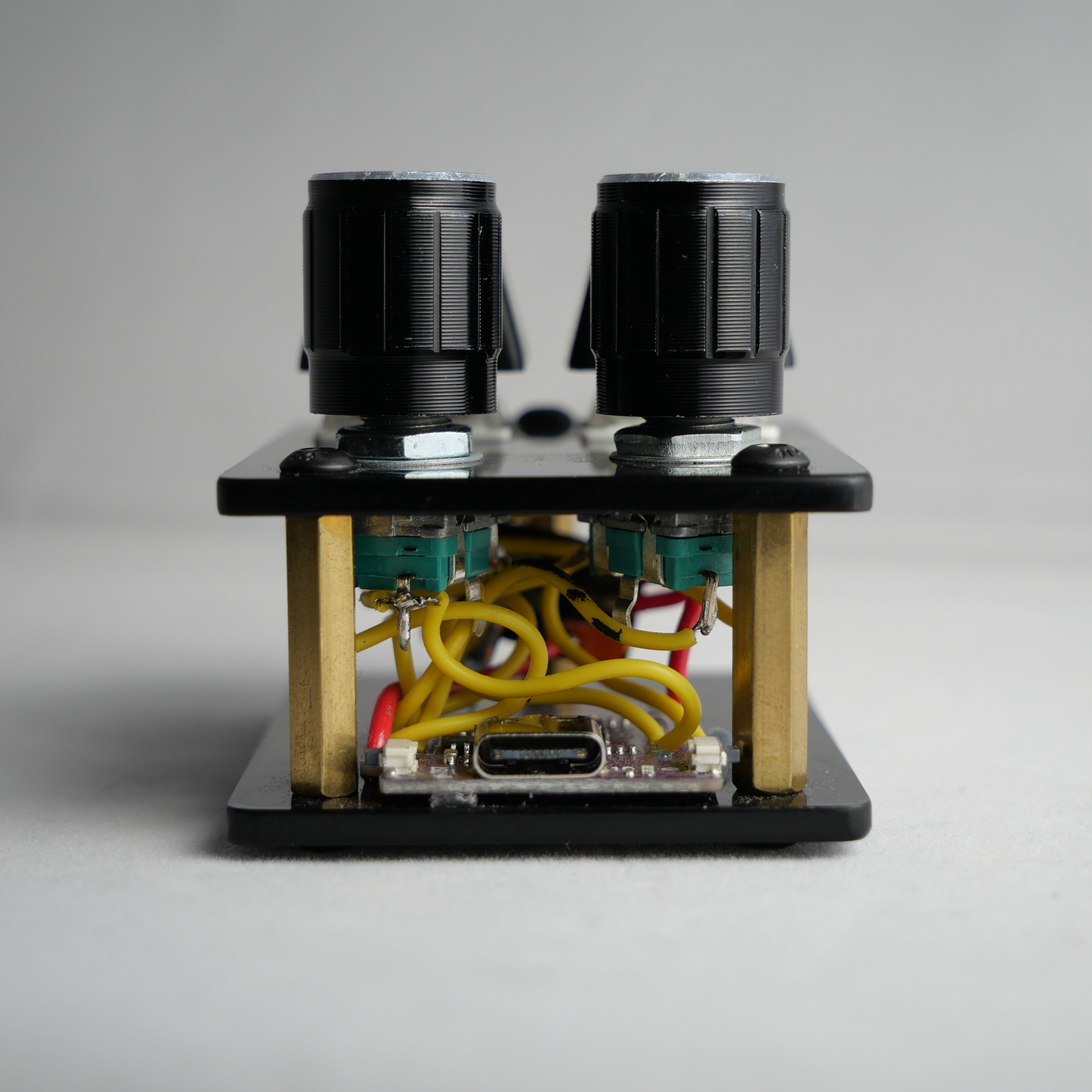 madMidiMini Compact Midi Controller Black Acrylic with 4 Note Buttons 2 Encoder Knobs and LEDs