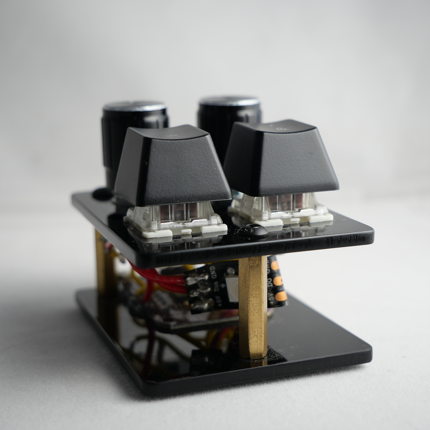 madMidiMini Compact Midi Controller Black Acrylic with 4 Note Buttons 2 Encoder Knobs and LEDs